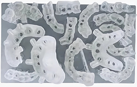 Batch printing of clear dental aligners